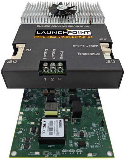 A black rectangular controller with three jack inputs and revealing a green circuit board.